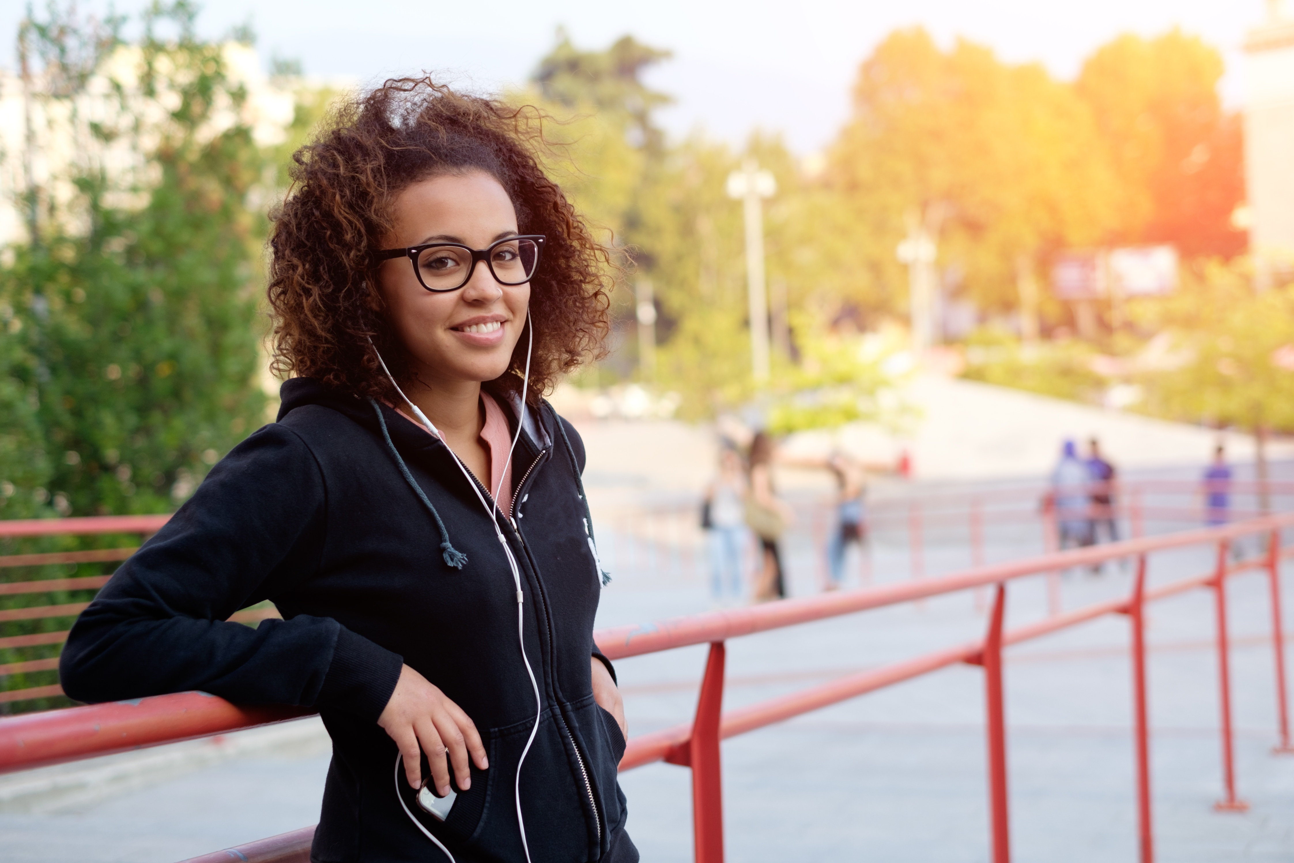 stock photo - smiling by railing